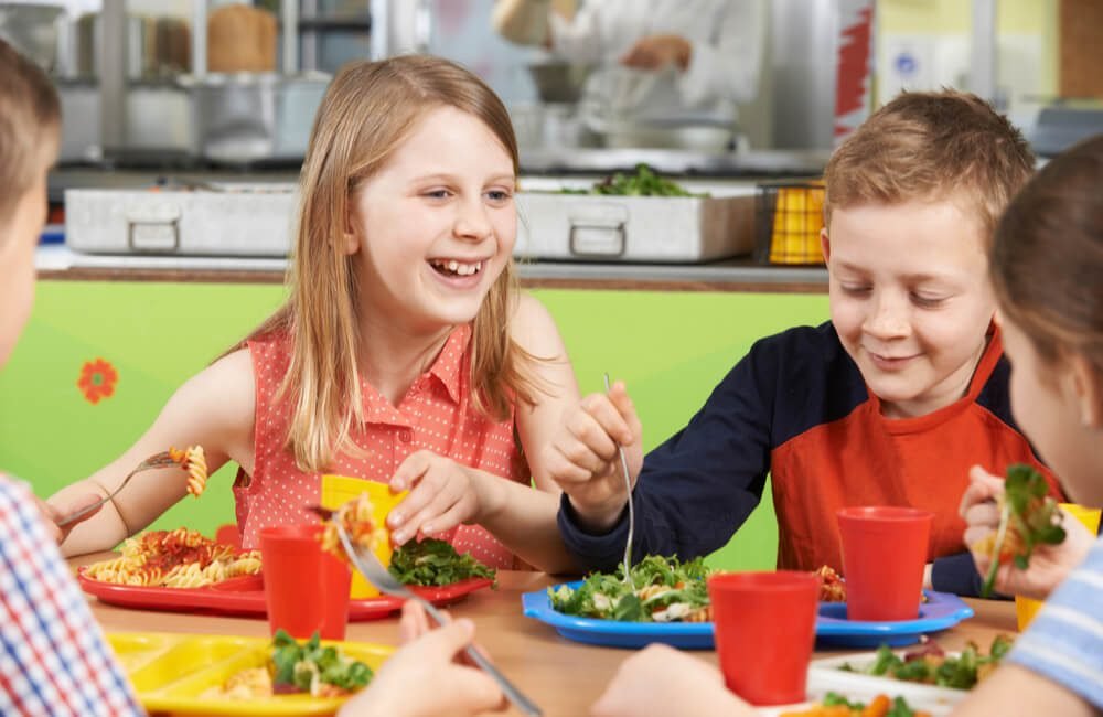 Children enjoying healthy food