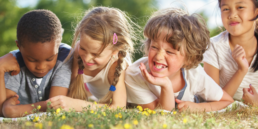 Kids engaged in online summer learning courses and educational activities