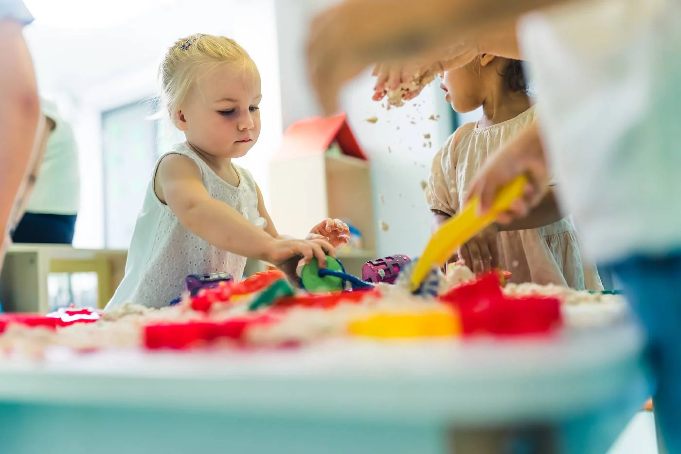 Toddler daycare sensory play activities in Canadian childcare center