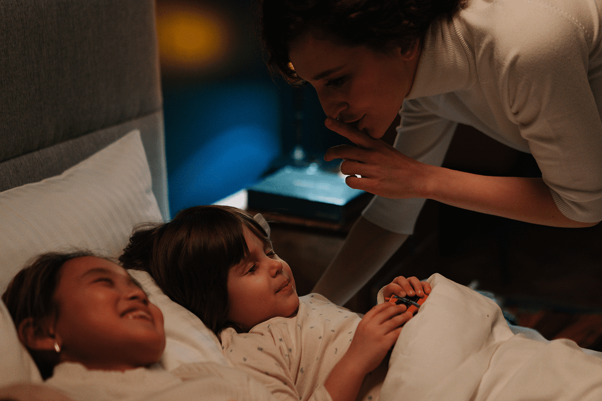 Canadian family bedtime routine with children preparing for sleep and parents providing guidance