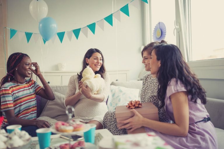 Canadian parents planning baby registry during pregnancy with excitement and preparation