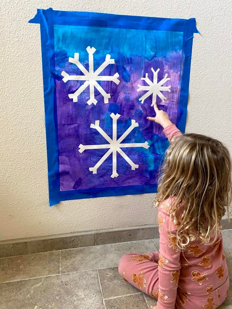 Baby exploring indoor winter crafts and sensory play