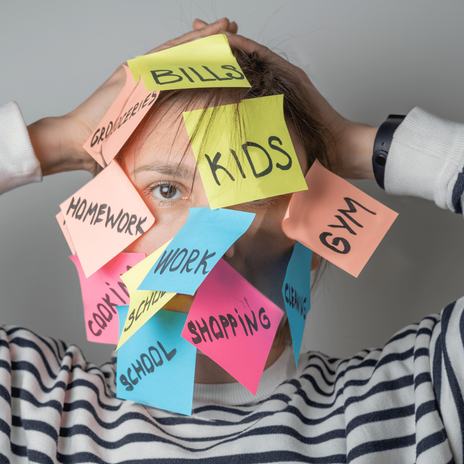 Illustration of the mental load of parenting weighing on a mother
