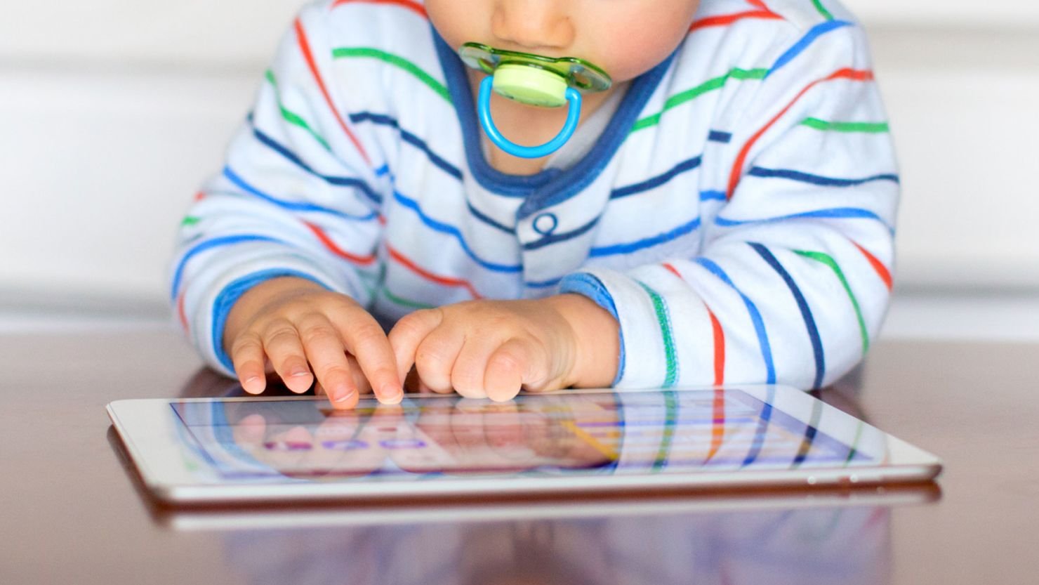 Baby watching tablet screen time